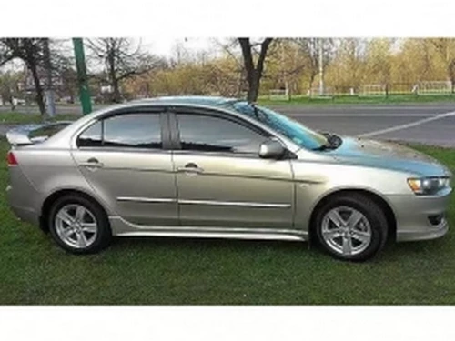 Дефлектори вікон Mitsubishi Lancer X (07-15) - Defl (накладні) 4